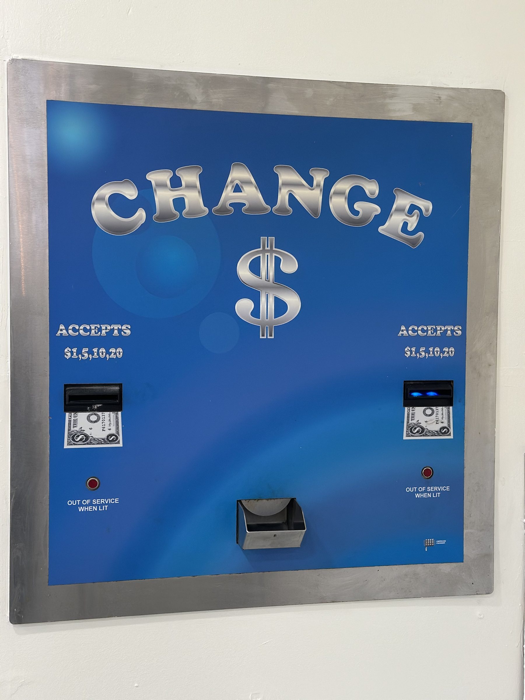 Bill-to-coin change machine, accepts $1, $5, $10, and $20